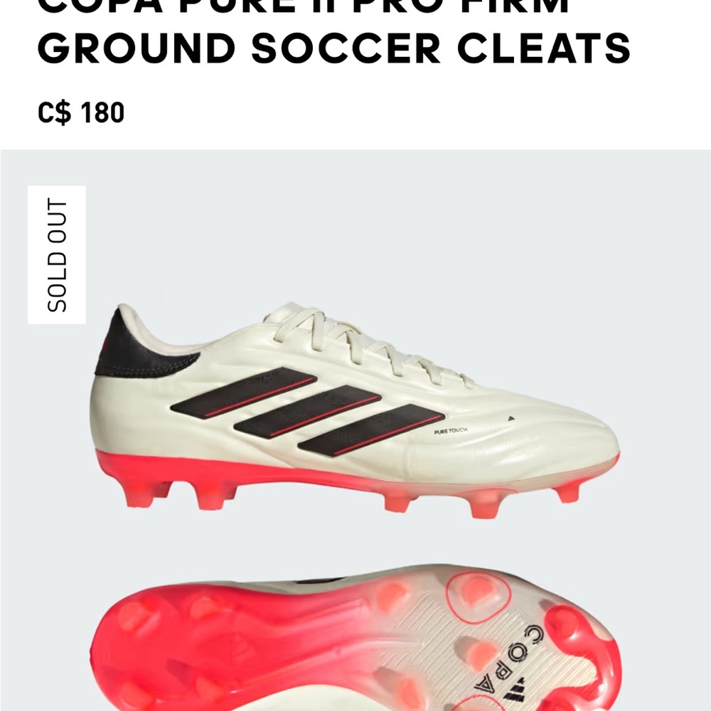Adidas White and Black Soccer Cleats with Red Soles